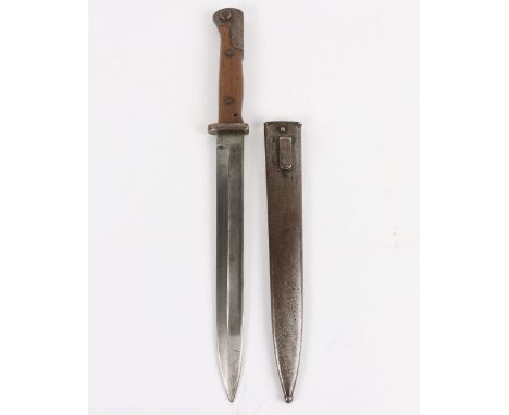 Imperial German S84/98 Bayonet, with two piece wooden grips, steel pommel and short cross guard. Housed in a steel scabbard. 