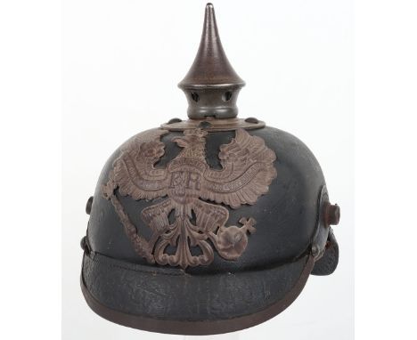 WW1 German Prussian M-15 Pickelhaube, leather shell helmet with field grey Prussian other ranks helmet plate (damaged), grey 