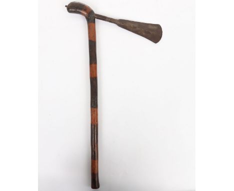African Tribal Axe, iron head 16.5 with incised decoration and 5cm cutting edge, on its wooden haft with bands stained for ef