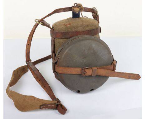 WW1 British Cavalry Equipment, consisting of khaki felt covered blue enamel water bottle with the leather harness and cloth s