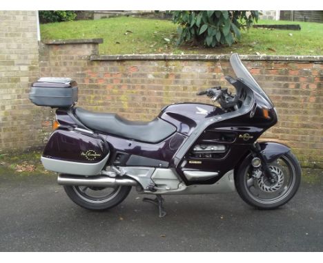 A 1994 Honda Pan European, registration number M677 YGN, frame number SC 264400104, engine number SC 26E2400401, purple. This
