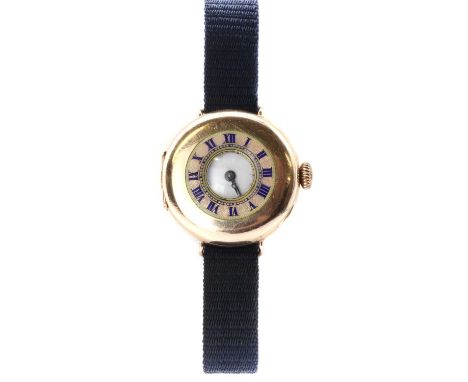 A 9ct gold half hunter style wristwatch,26mm diameter with a guilloché enamel chapter ring to the front cover with royal blue