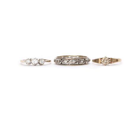 Two 9ct gold rings,comprising a single stone diamond ring, London 1983, and a three stone cubic zirconia ring, London, 2.90g 