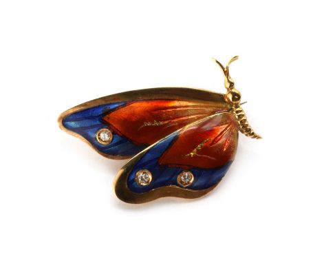 An 18ct gold diamond set and enamel butterfly brooch, with yellow, red and blue enamel wings, spitch set with brilliant cut d