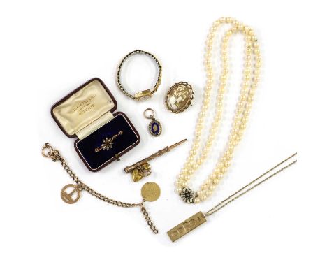 A collection of gold and costume jewellery, to include a 9ct gold ingot pendant suspended on a trace chain, London 1978, a go