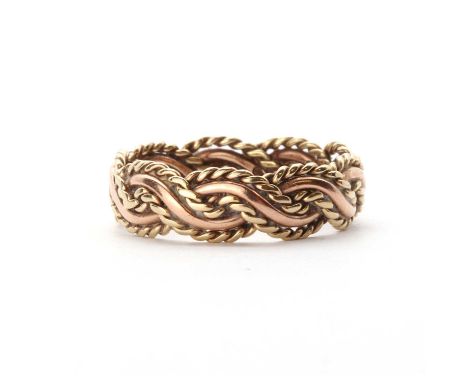 A 9ct gold ring, by Clogau, with plaited rose gold and twisted yellow gold wire, Sheffield 1998, 5.25mm wide, 2.29g.Finger si