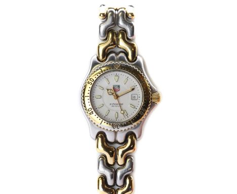 A ladies' bi-colour Tag Heuer 'Professional' quartz bracelet watch,a white enamel dial with baton hour markers and hands, wit