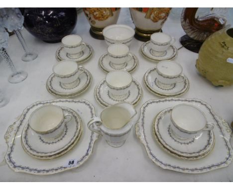 A ROYAL WORCESTER FLIGHT & BARR STYLE EIGHT PLACE SETTING TEA SET (NO TEA POT) FOR WARING AND GILLOWS