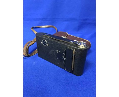 PAIR OF BINOCULARS AND A FOLDING CAMERA