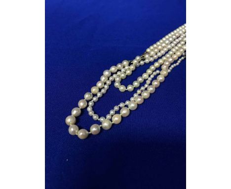 THREE PEARL NECKLACES