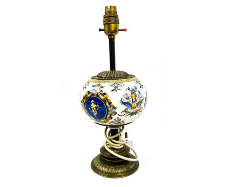 A ceramic and brass mounted Italian style Gien faience table lamp, 15cms wide x 37cms high. Estimate £10-30.