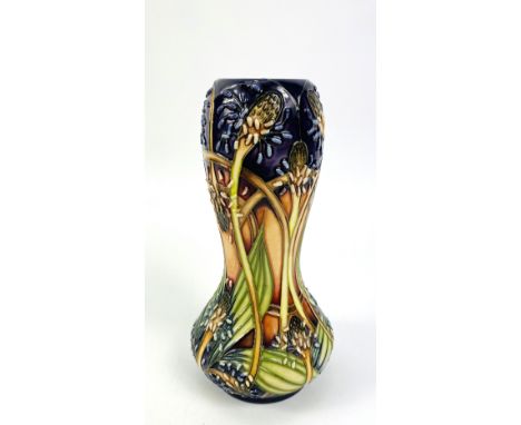 A Moorcroft pottery "Soldiers Grass" pattern vase designed by Emma Bossons, signed to the underside. 8cms wide x 16.5cms high