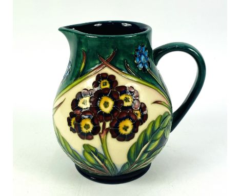 A Moorcroft pottery "Springtime at Home" pattern limited edition jug designed by Philip Gibson, signed to the underside. 14.5