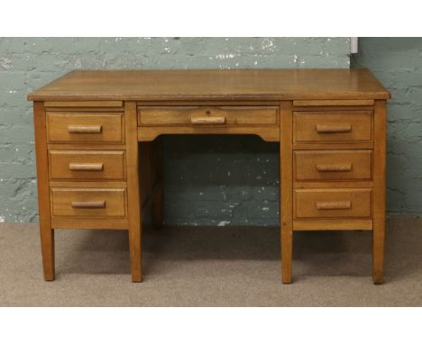 A vintage oak desk by Bell Barn.