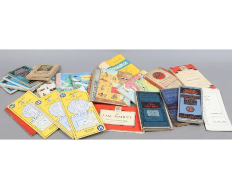 A box of vintage ordnance survey maps, American Geographical Society books and Michelin maps.