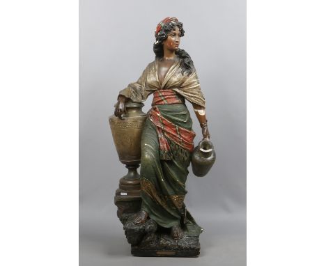 A C19th Goldscheider style large painted terracotta figure of a gypsy girl collecting water (AF).