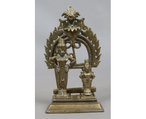 An Indian bronze deity.