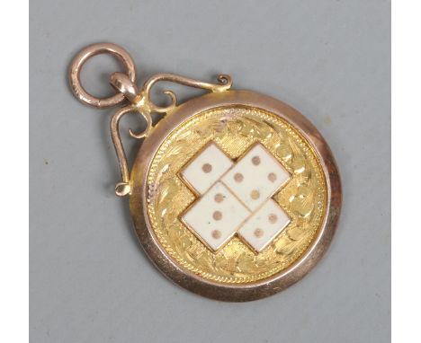 A 9ct rose gold domino medal fob with enamel decoration and engraved W.E.C.C Rochester cup F. Lee 1929 assayed Birmingham 192