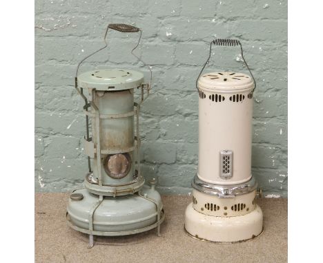 Two early enamel parafin heaters.