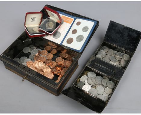 A vintage tole ware cash tin with folding brass handle and contents of British pre-decimal coins.