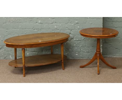 A yew wood two tier coffee table along with a similar tripod occasional table.