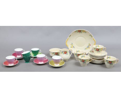 A Royal Doulton part tea service along with a multi coloured coffee set.