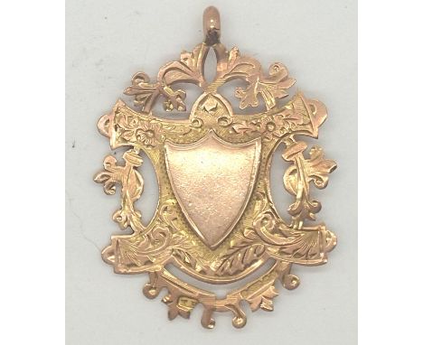 9ct gold antique 1920 fob medal with rampant lion 5.5g. P&amp;P group 1 (£16 for the first item and £1.50 for subsequent item