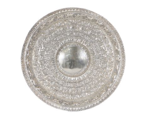 A LARGE CEYLONESE SILVERED METAL MOONSTONE PLATTER, C.1910. the design for this tray is based on the semi circular 'moonstone