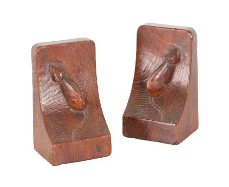 ROBERT MOUSEMAN THOMPSON (1876-1955): A PAIR OF ENGLISH OAK BOOK ENDS. both with carved mouse trademark, 9cm wide and 15cm hi