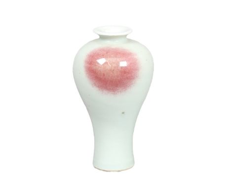 A SMALL 19TH CENTURY CHINESE CELADON AND COPPER RED SPLASH FLAMBE GLAZED VASE, MEIPING. of slender tapering form, with everte