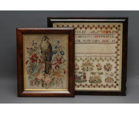 A VICTORIAN WOOLWORK SAMPLER, the panel worked by Elizabeth Robinson, August 17th, 1882, in coloured wools on a coarse ground