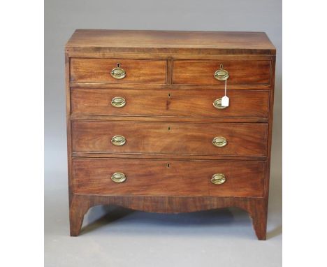 A GEORGIAN MAHOGANY CHEST, c.1800, the caddy top over frieze with stringing, two short over three long drawers below with ova