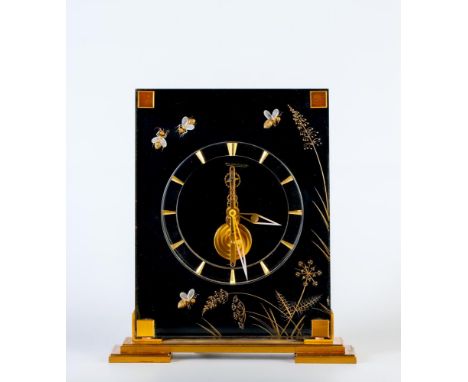A JAEGER-LECOULTRE MANTEL TIMEPIECE, the skeleton in line eight day movement with 4 1/4" dial with gilt hour batons, the luci