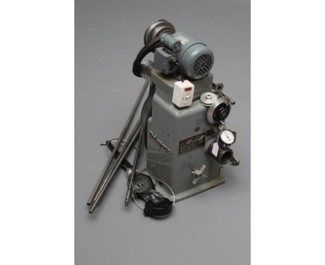 A DELAPENA BENCH-MOUNTED HONING MACHINE, for the honing and lapping/polishing of shotgun barrels, model no.104 (Est. plus 21%