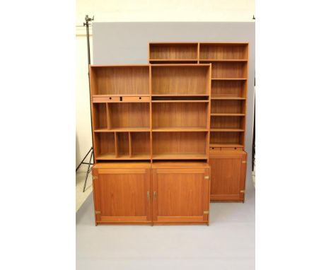 A DANISH TEAK LYBY SYSTEM 400 MODULAR ROOM UNIT, designed by Bent K. Handest, 1960's, and comprising a pair of two door cupbo