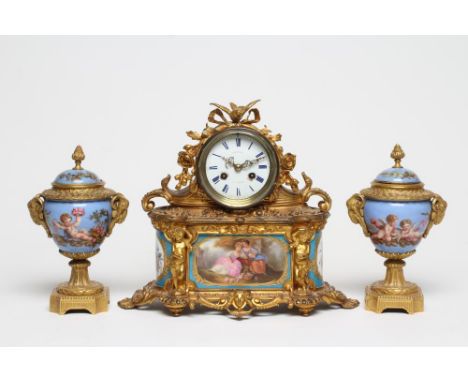 A FRENCH GILT METAL AND PORCELAIN MANTEL CLOCK, 19th century, the twin barrel movement with 3 1/4" white enamel dial with blu