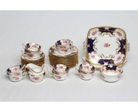 A COALPORT CHINA PART TEA SERVICE, early 20th century, printed and painted with the "Batswing" pattern, comprising twelve tea
