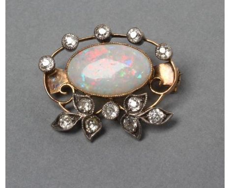 AN OPAL AND DIAMOND BROOCH, the oval cabochon polished opal collet set to an open frame set with twelve small diamonds, unmar