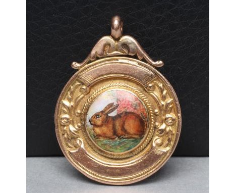 A 9CT GOLD FOB centred by a roundel enamelled with a rabbit, the reverse engraved "E.A.F. & F.S. 1919 J. Lister", Birmingham 