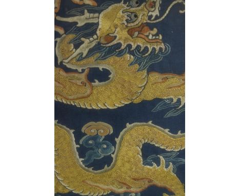Chinese needlework. Yellow dragon. Intricately sewn with detailed dragon scales. Framed and glazed. H.57 W.44 cm. 