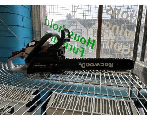 A Spear and Jackson petrol driven chainsaw with new blade and chain, shipping unavailable 