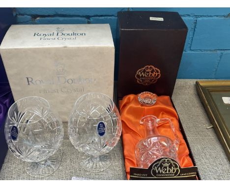 A boxed pair of Royal Doulton brandy crystal glasses and a Webb cut glass crystal small decanter 