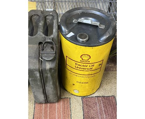 A vintage Shell tractor oil can and a military jerry can dated 1950. Shipping unavailable 