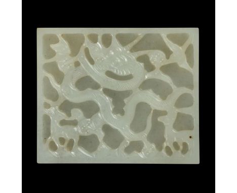  CHINESE WHITE JADE 'DRAGON' BELT PLAQUE MING DYNASTY 明 白玉雕龍紋帶板of rectangular shape, carved to one side with a writhing three