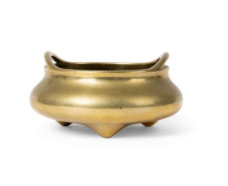  CHINESE BRONZE TRIPOD CENSER QING DYNASTY, 18TH-19TH CENTURY 清 宣德款 銅橋耳三足爐of bombé form with everted loop handles, the base c