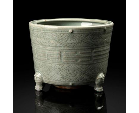 CHINESE LONGQUAN CELADON-GLAZED 'EIGHT TRIGRAMS' TRIPOD CENSER MING DYNASTY 明 龍泉青釉八卦紋劃花香爐sturdily potted, of tapering cylindr