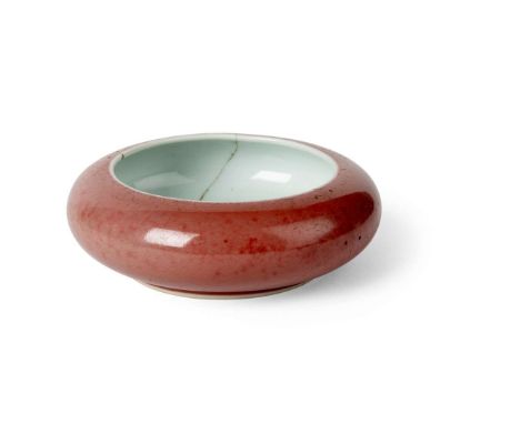  CHINESE RED-GLAZED BRUSH WASHER QING DYNASTY, KANGXI MARK AND OF THE PERIOD 清康熙款及年代 豇豆紅釉鏜鑼洗of compressed globular form with 