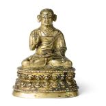 F SINO-TIBETAN BRONZE SEATED LAMA