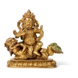 SINO-TIBETAN GILT-BRONZE FIGURE OF VAISHRAVANA