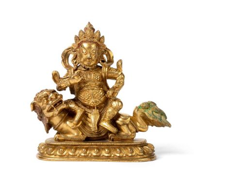  SINO-TIBETAN GILT-BRONZE FIGURE OF VAISHRAVANA QING DYNASTY, 18TH-19TH CENTURY 清 銅鎏金寶財天王座像the Guardian of the North cast sea